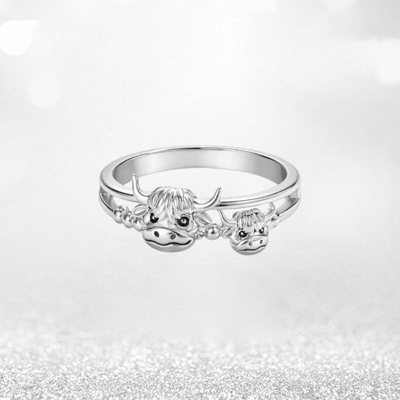 Highland-Cow-Guardian-Ring: Eine wärmende Präsenz an Ihrer Fingerspitze, die die tiefe Bindung zwischen Mutter und Kind symbolisiert