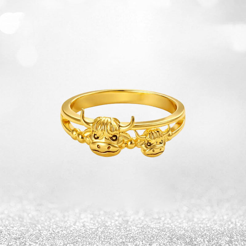 Highland-Cow-Guardian-Ring: Eine wärmende Präsenz an Ihrer Fingerspitze, die die tiefe Bindung zwischen Mutter und Kind symbolisiert